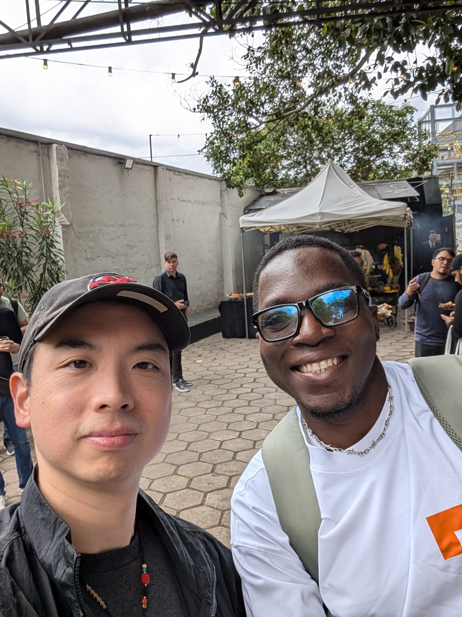 Two members of the Let Africa Build team after the AIBTC and Bitflow competition wins in Lagos